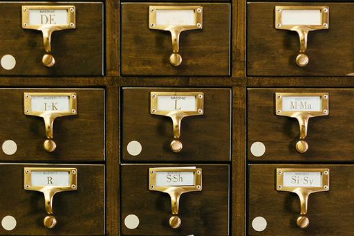 Card catalogue or filing cabinet front. 
