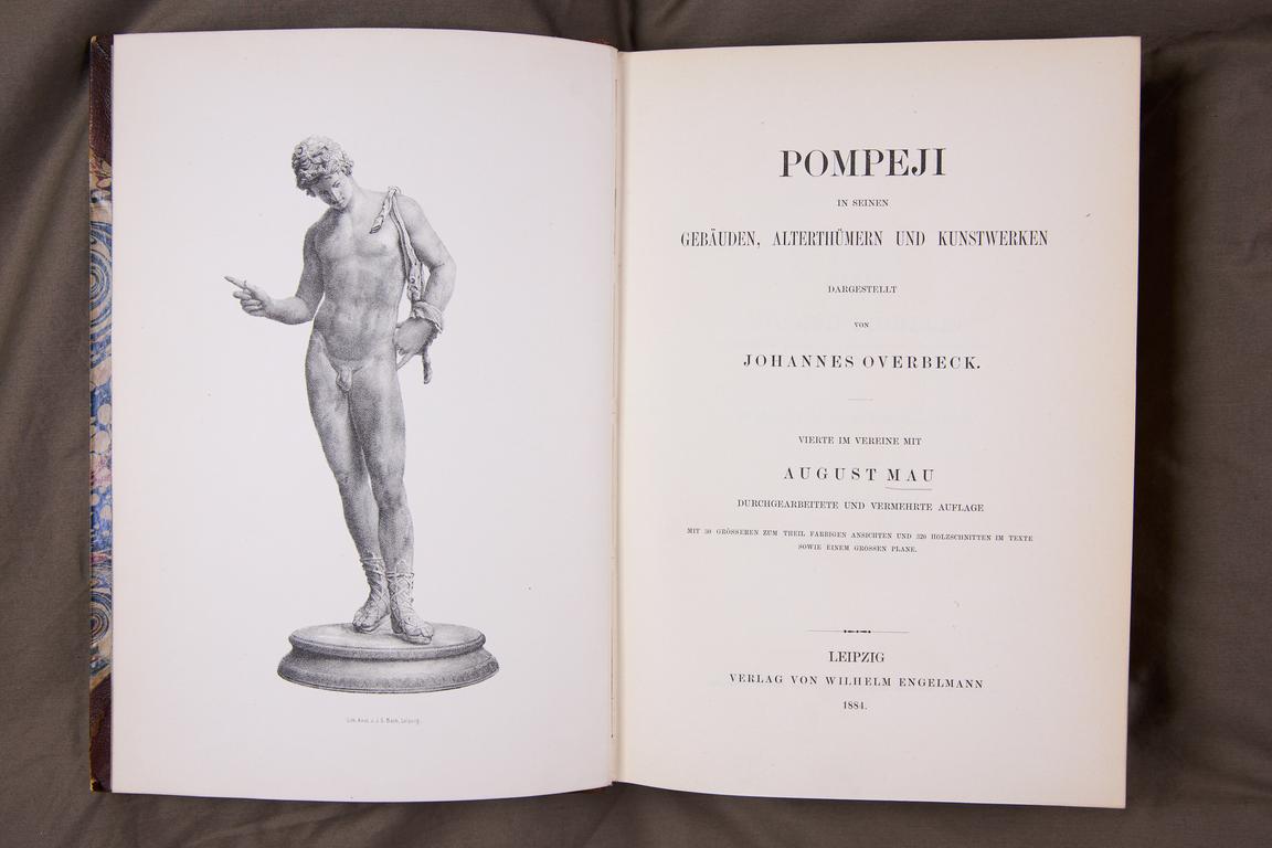 Titeluppslag av August Maus bok om Pompeji, 1884.