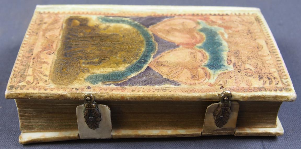 Den swenska psalmboken. Printed in Stockholm, 1826. Contemporary full parchment binding with coloured covers and clasps. 'Fästmansband' (literally 'fiancé binding').